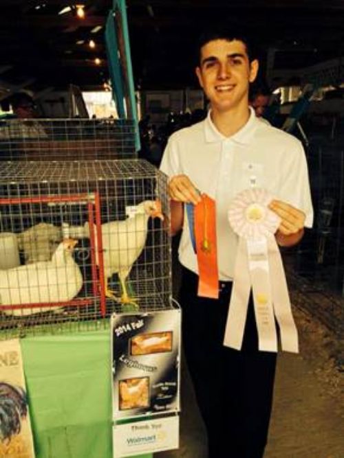 Michigan 4-H'er Ryan Rich with his poultry project.