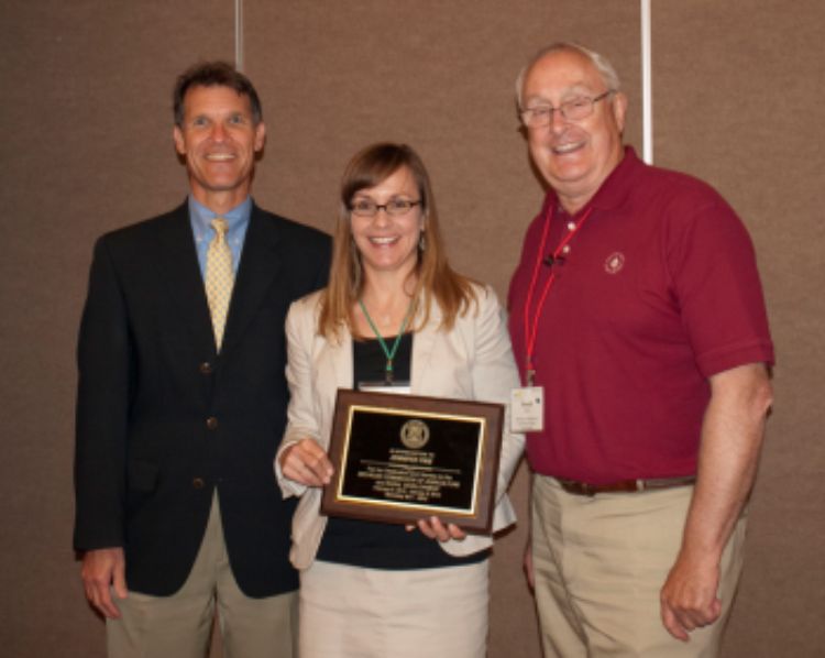 Jennifer Fike receiving a special award for service on the Michigan Agriculture Commission. Photo courtesy of Patty Cantrell.