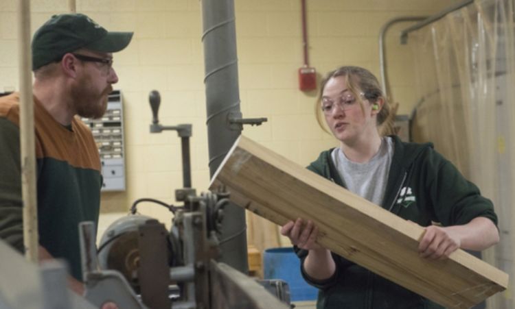 Dan Brown and Tammy Wright discuss an urban wood project for Sparty's Cabin