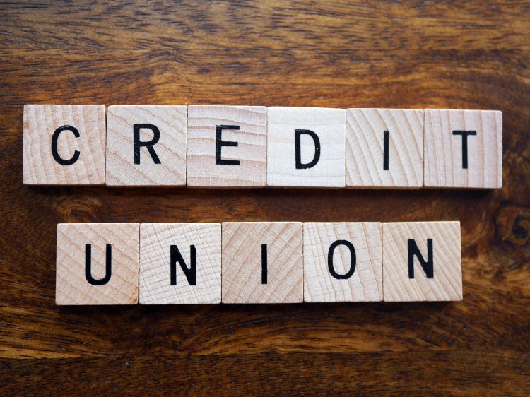 Credit union spelled out with Scrabble letters