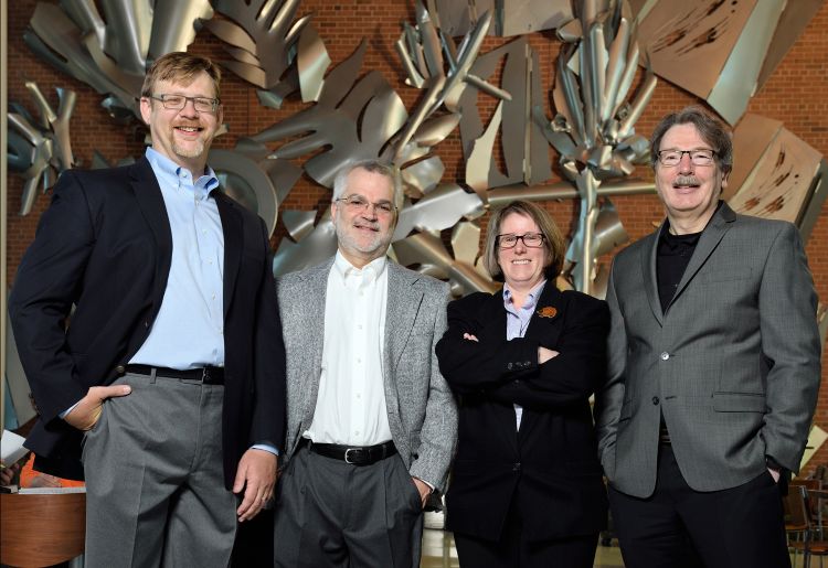 (Left to right): Andrew Christlieb, Dean Della Penna, Robin Buell and Christoph Benning. Photo by Harley Seeley.