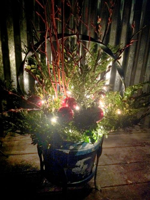 Add an outdoor floral arrangement to your holiday decorating.