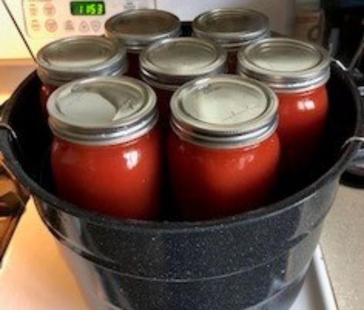 Tomato juice in jars.