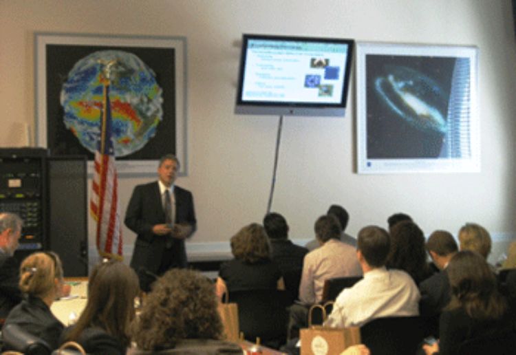 Doug Landis presents information to legislators and their staff members in Washington, D.C.