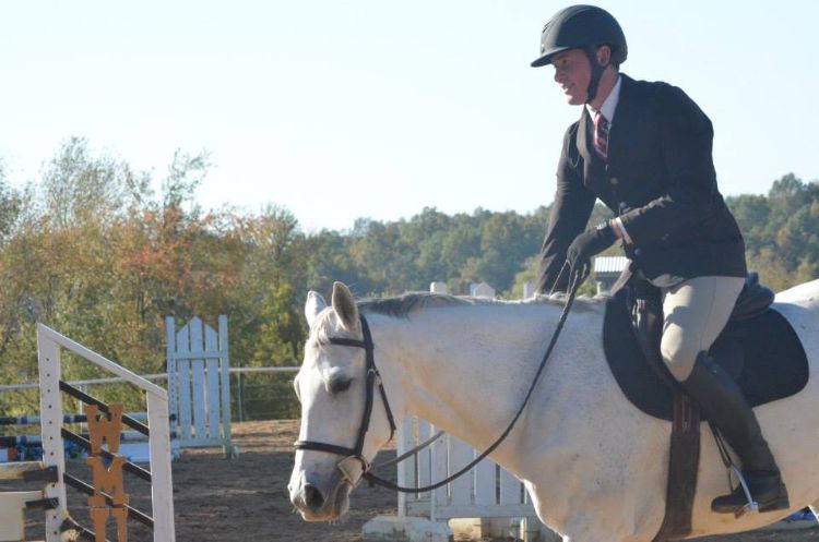 Co-author Caleb Charles showing on MSU’s IHSA Hunt Seat Equestrian Team.