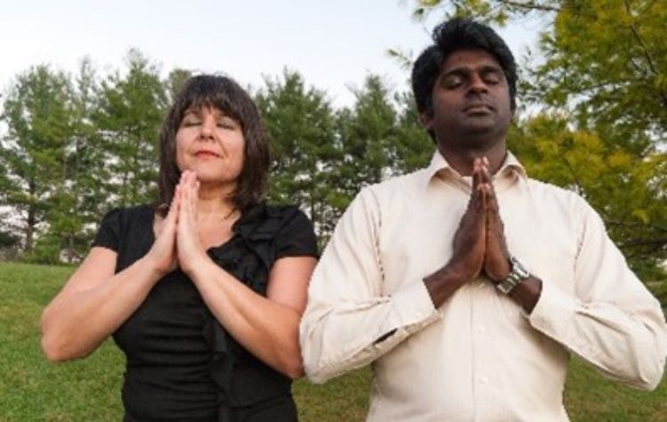 Interracial couple praying.