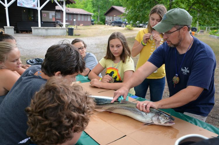 Michigan Sea Grant Extension educator Brandon Schroeder was honored recently with an MSU Distinguished Staff Award. In this picture, he is shown working with campers attending the 2018 4-H Great Lakes Natural Resources Camp. He is one of the co-leaders of the camp. Photo credit: Michigan Sea Grant
