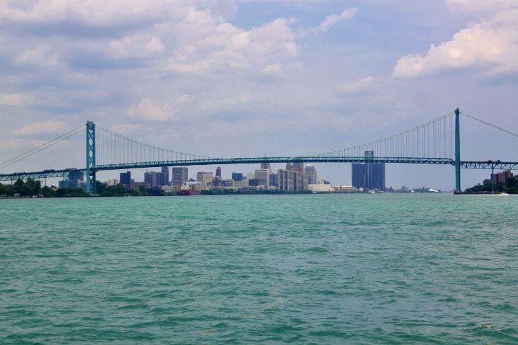 Looking upstream on the Detroit River toward the Ambassador Bridge and Downtown Detroit.  Picture by I Will Shoot You Photography.
