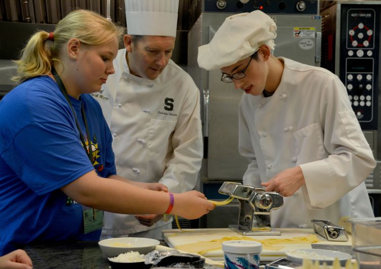 Youth engage with culinary staff and experts at the 2015 4-H Exploration Days.