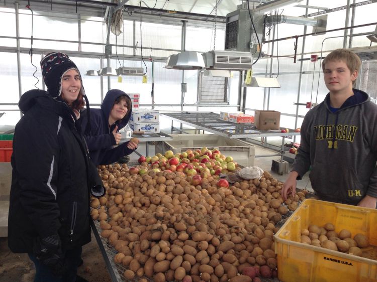 Montague FFA students visit a potato farm. Over 100 pounds of Michigan potatoes are being served in Montague and Whitehall districts each week in February 2017. | Photo by Lynn DeVlieg