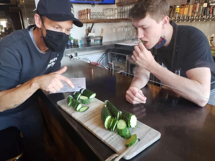 Chef Kris Stunkard and staff taste Seed to Kitchen cucumbers