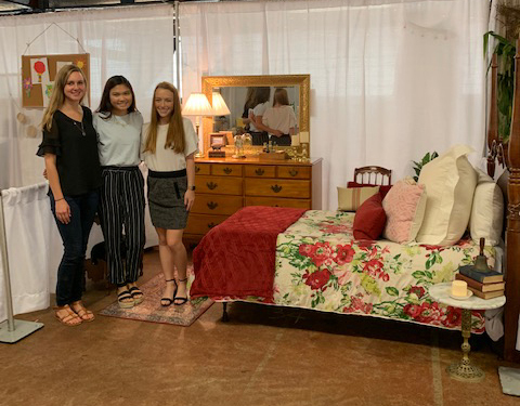 Third place team in the bedroom they designed.