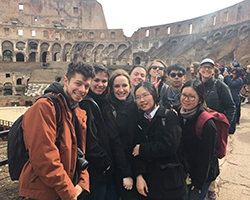 Class photo at the Colosseum in Rome, Italy.