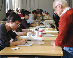 Bill Johnson in design studio with students.