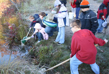 Students gathering samples for an experiment.