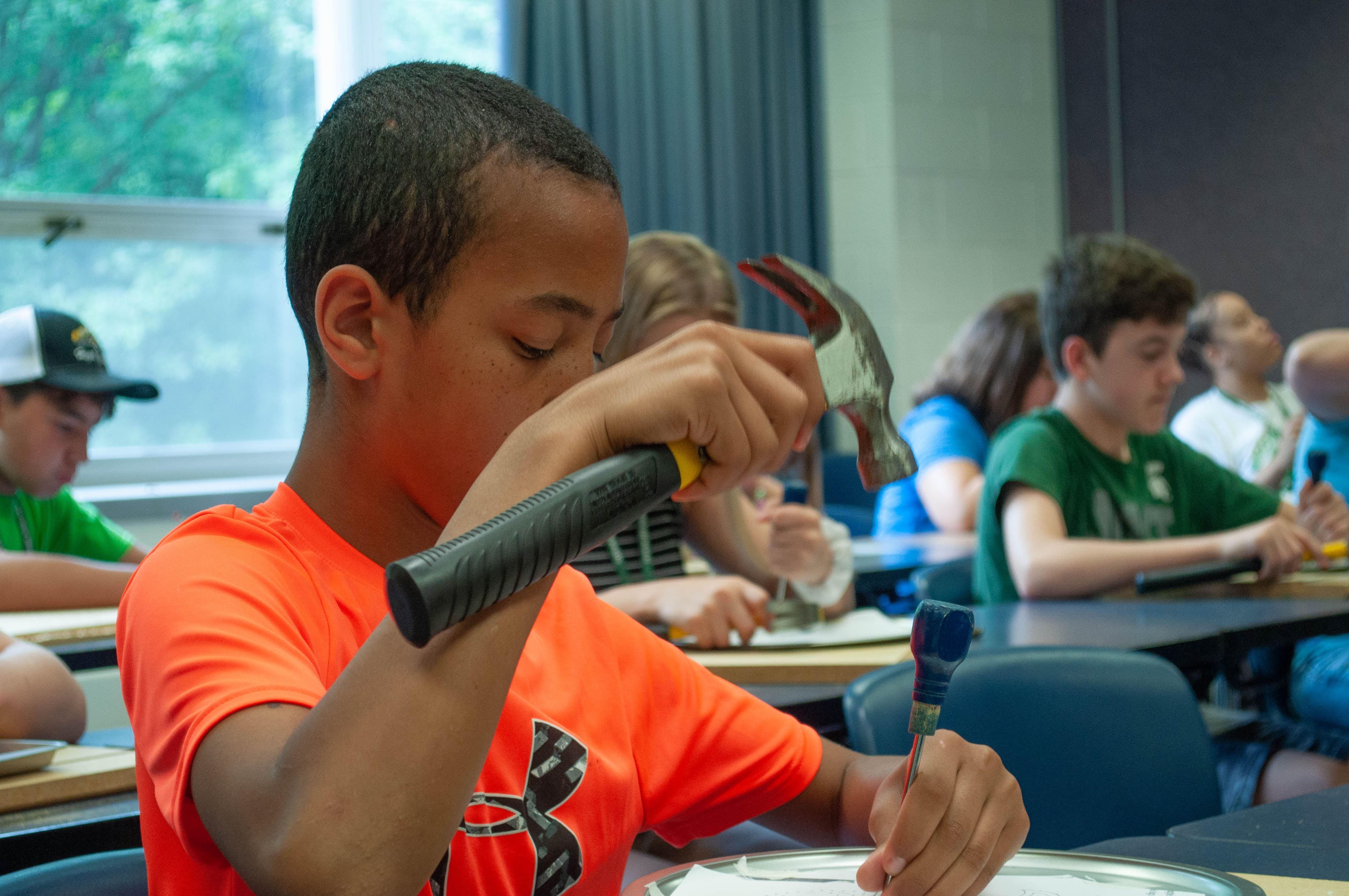 Child taking classes at exploration days