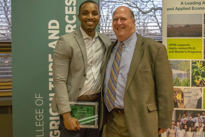 Espoir with AFRE's Larry Zink at the AFRE Awards Night