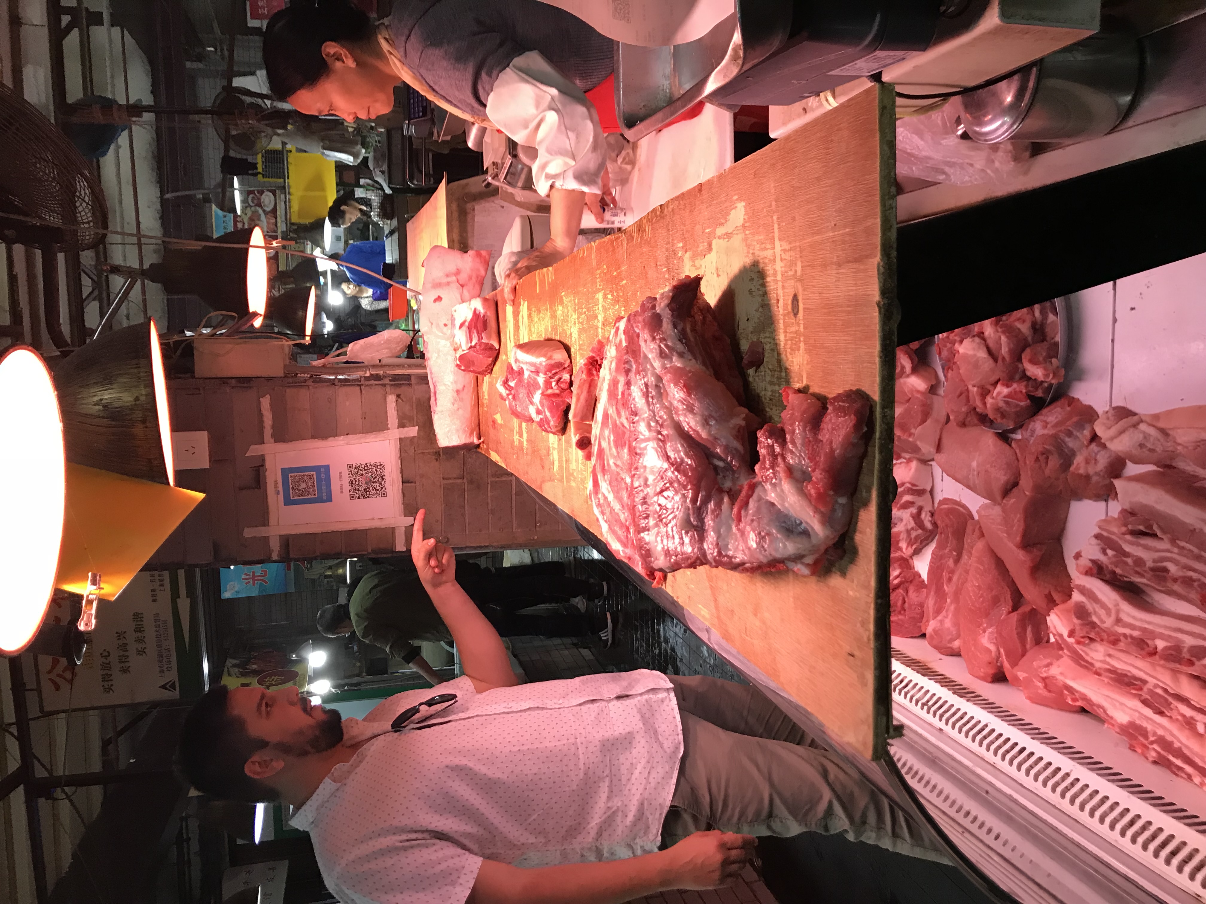David_Ortega_talking_to_Pork_Producer_in_China