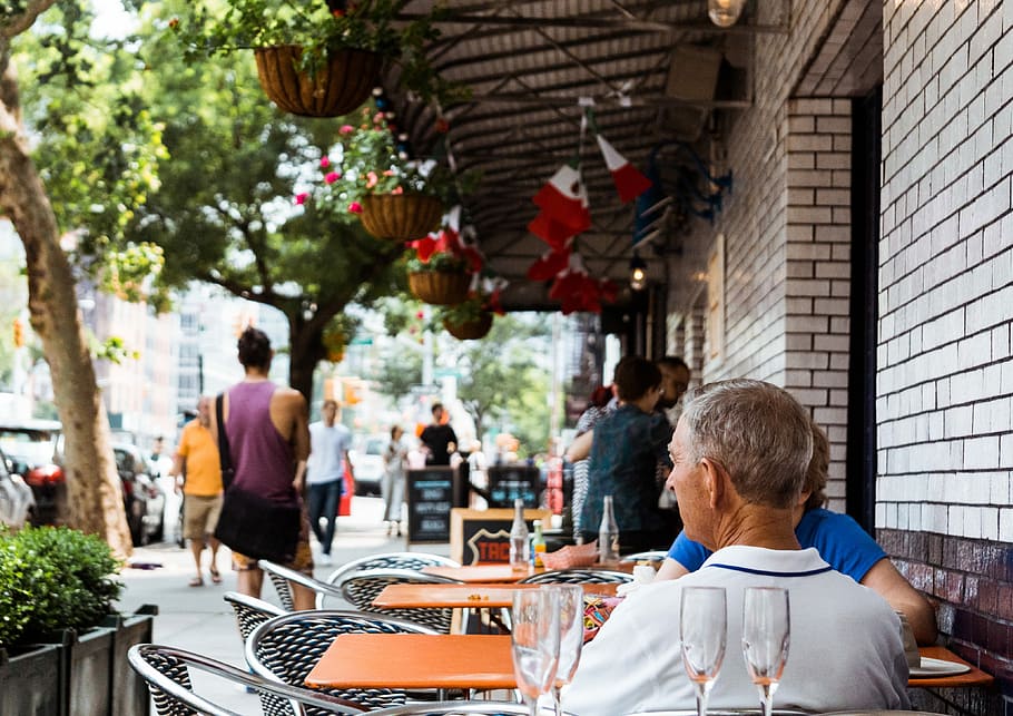 People sitting at outdoor restaurant