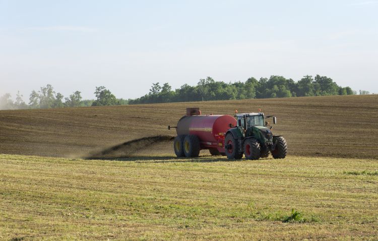 manure spreader on field