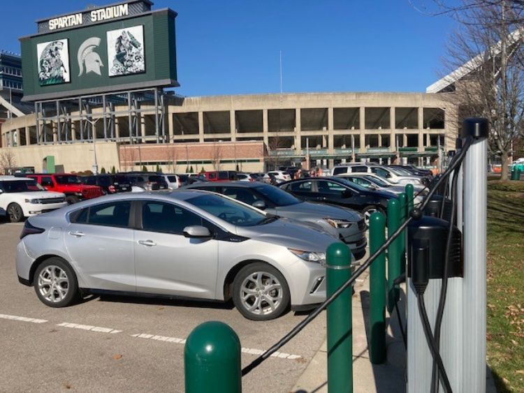 Car charging stations in front of MSU stadium