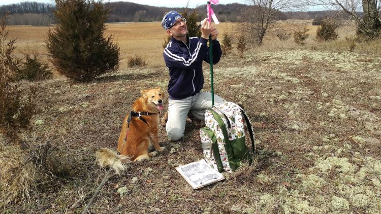 Conservation Steward volunteer Eddie Sullivan helps monitor grassland habitat at the Arcadia Dunes Dry Hill Grassland, one of many preserves owned and managed by the Grand Traverse Regional Land Conservancy.