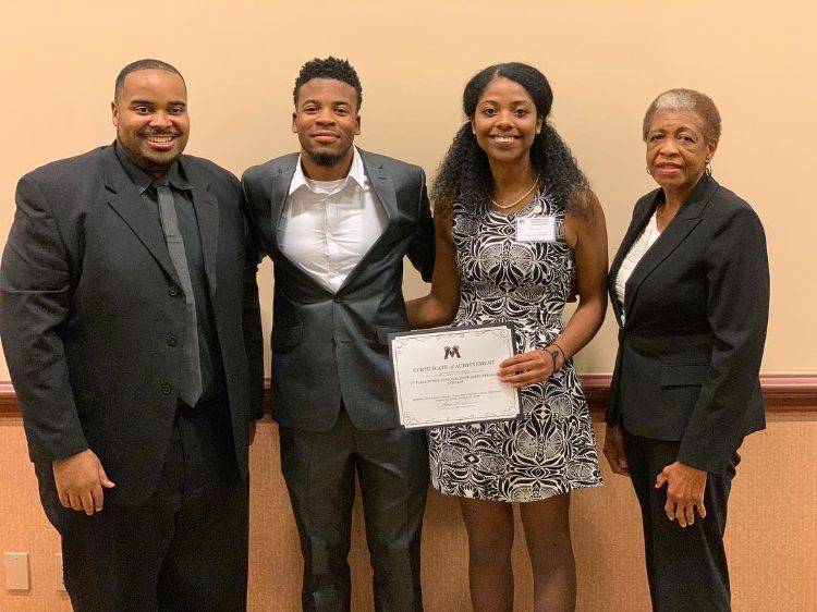 Phillip Seaborn, co-advisor and assistant director for undergraduate diversity in the MSU College of Agriculture and Natural Resources; Labrawn Wade, chapter president; Micah Cuevas, chapter member and winner of the MANRRS Region V impromptu public speaking contest; and Eunice Foster, co-advisor and MSU CANR professor.