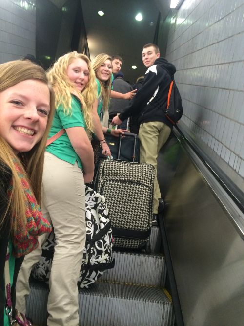 Michigan 4-H members riding the escalator at the subway station in Atlanta, Georgia on their way to National 4-H Congress.