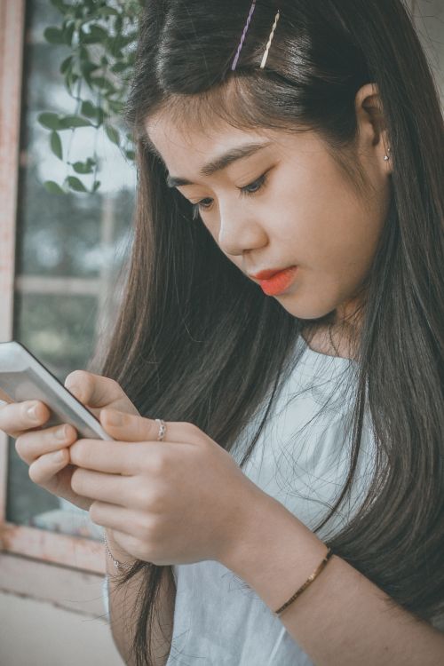 Girl looking at her phone