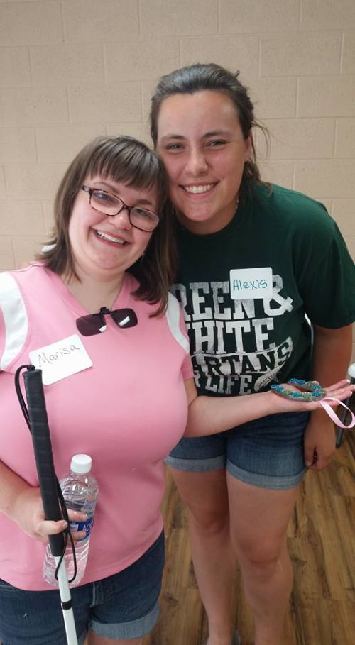 Alexis Garbo and Marisa Gibson at Bloom Where You’re Planted, a program that pairs youth leaders with individuals with disabilities for a summer at Hidden Lake Gardens. 