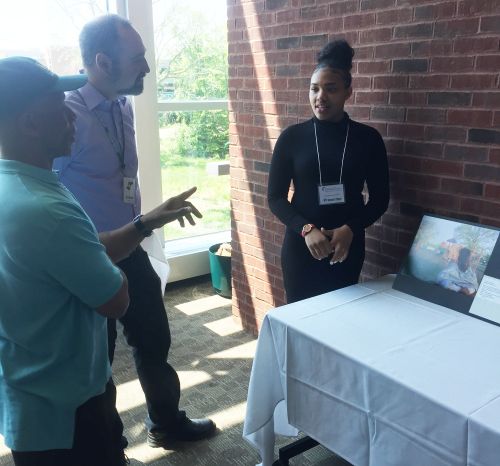 Students from schools in the Southeast Michigan Stewardship (SEMIS) Coalition present their photovoice projects to SEMIS participants and stakeholders at the 2016 Community Forum.