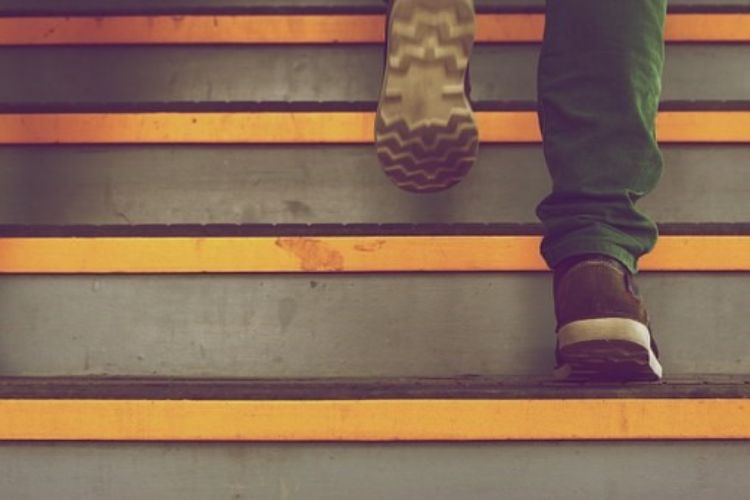 a person walking up steps