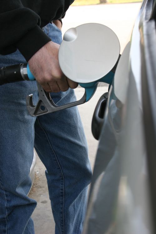 Pumping gas into a car