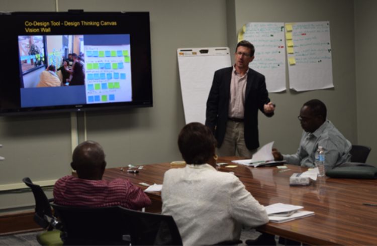 Wayne Beyea presenting to a group of UNIDO delegates from Nigeria during an MSU UN training.