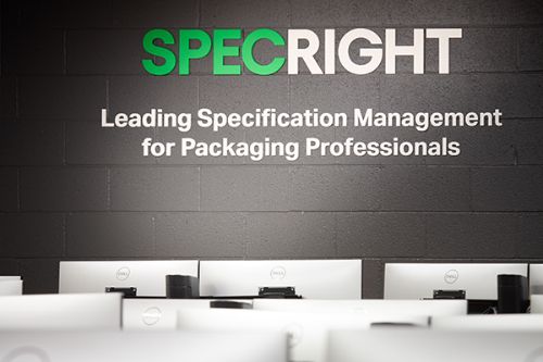 Specright Leading Specification Management for Packaging Professionals. Photo of the renovated computer lab and signage on the wall in the lab.