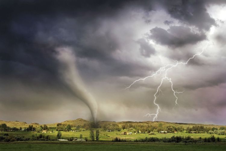 A tornado during a thunderstorm.