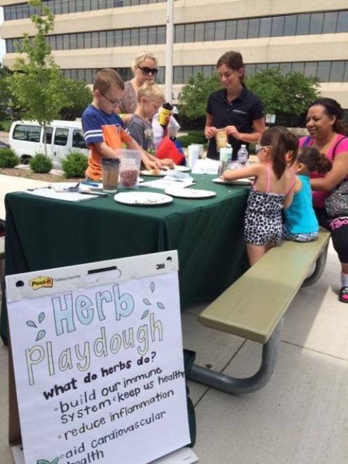 Brandi Stein, conducting Michigan Fresh nutrition education activities at the Muskegon Farmers Market