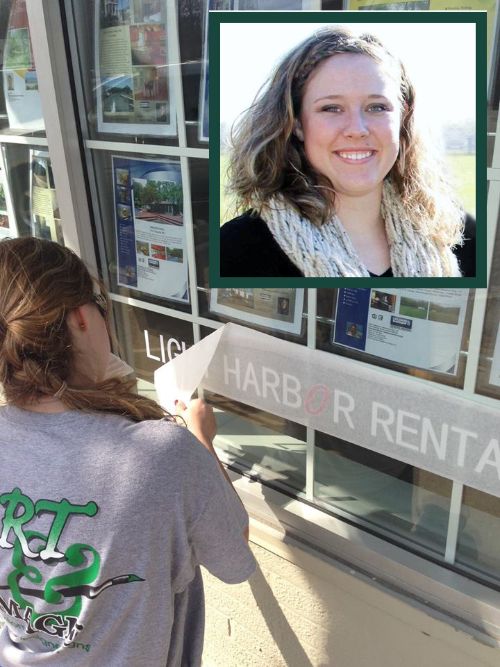Kaitlynn Miller, Berrien County 4-H alum and owner of Art & Image of Harbor Country in New Buffalo, installs graphic work for a client.