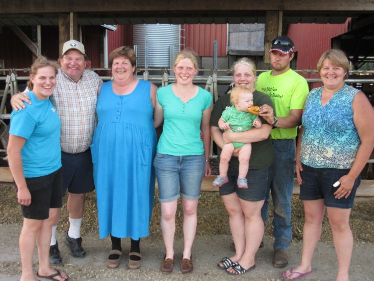 Weiss family and Sandra Wefer, 2015 IFYE participant. Left to right: Lydia, Roger, Joanmarie, Sandra Wefer, Bethany holding granddaughter Lilly, Scott and Margie.