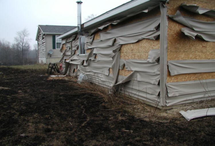 Structure damaged in a Michigan grass fire. Photo credit: MSU Extension Firewise PowerPoint archive l MSU Extension