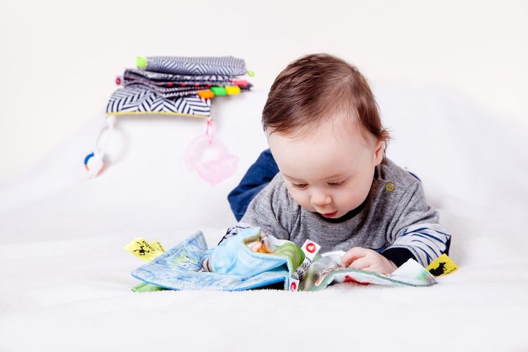 Baby reading a book