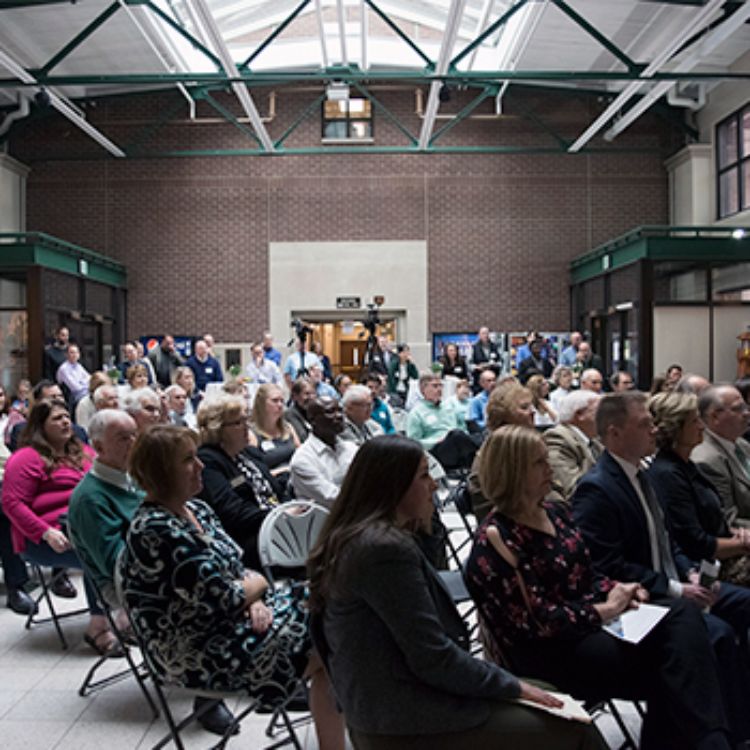 Colleagues, friends of family of David Schweikhardt gathered in the Agriculture Hall Atrium