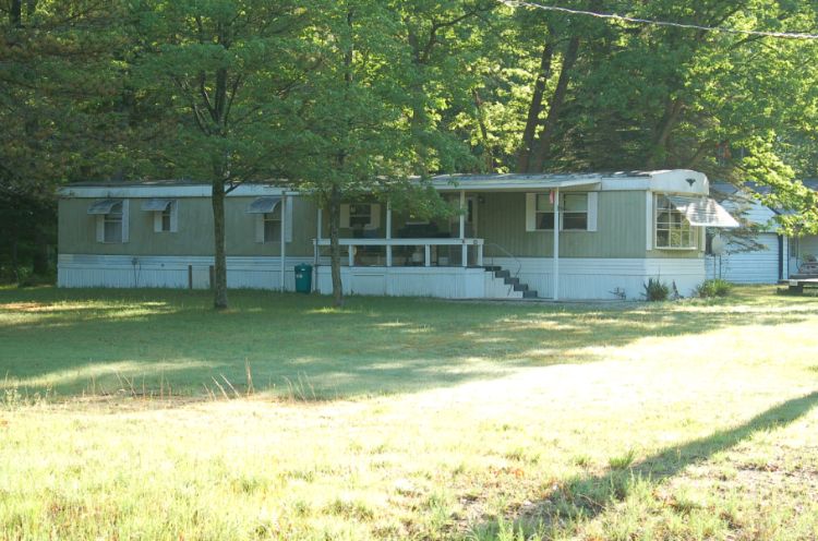 Mobile home housing in Stronach Township