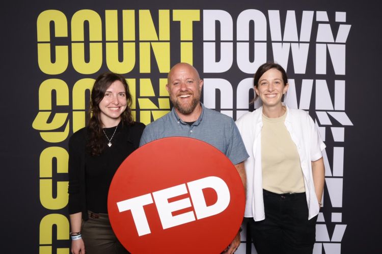 FCVP team members, Daphna Gadoth (left), Aidan Ackerman (middle), and Sara Constantineau (right) posing for a picture at the TED Countdown Summit in Detroit, Michigan on June 12, 2023.