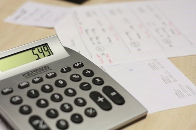 Calculating finances. Photo by Pixabay.