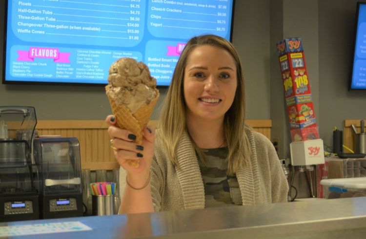 Dairy Store Manager Brekelle Wiedenmannott shows off the new MSU Polar Vortex flavor of ice cream.