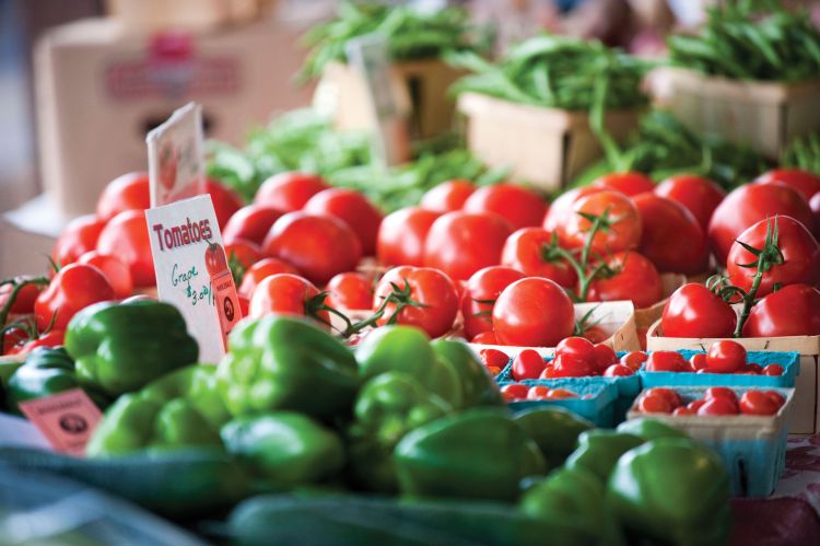 Tomatoes and green peppers at market