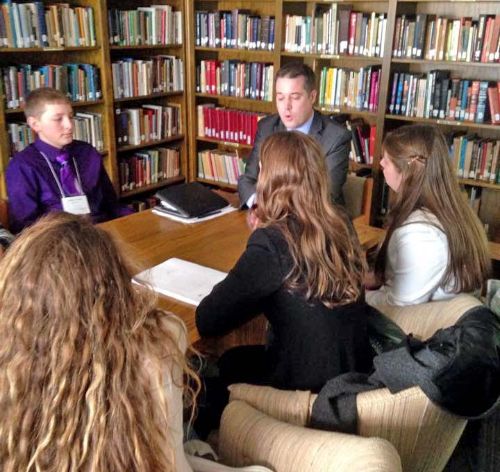 The 4-H Capitol Experience education issue group meeting with the Michigan Association of School Administrators to discuss education policy in Michigan.