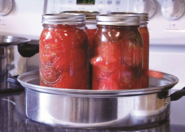 An image of some jars sitting in a sauce pan
