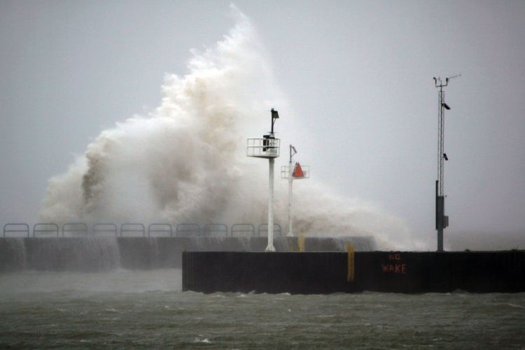 Waves on Lake Michigan crash over nearshore structures.  Photo: Justin Selden, Michigan State University Extension